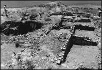 Roomblock and Kiva 1, Area 1, facing west. Note loss of southern and northern walls to erosion. (BW-YJ-JC-007)